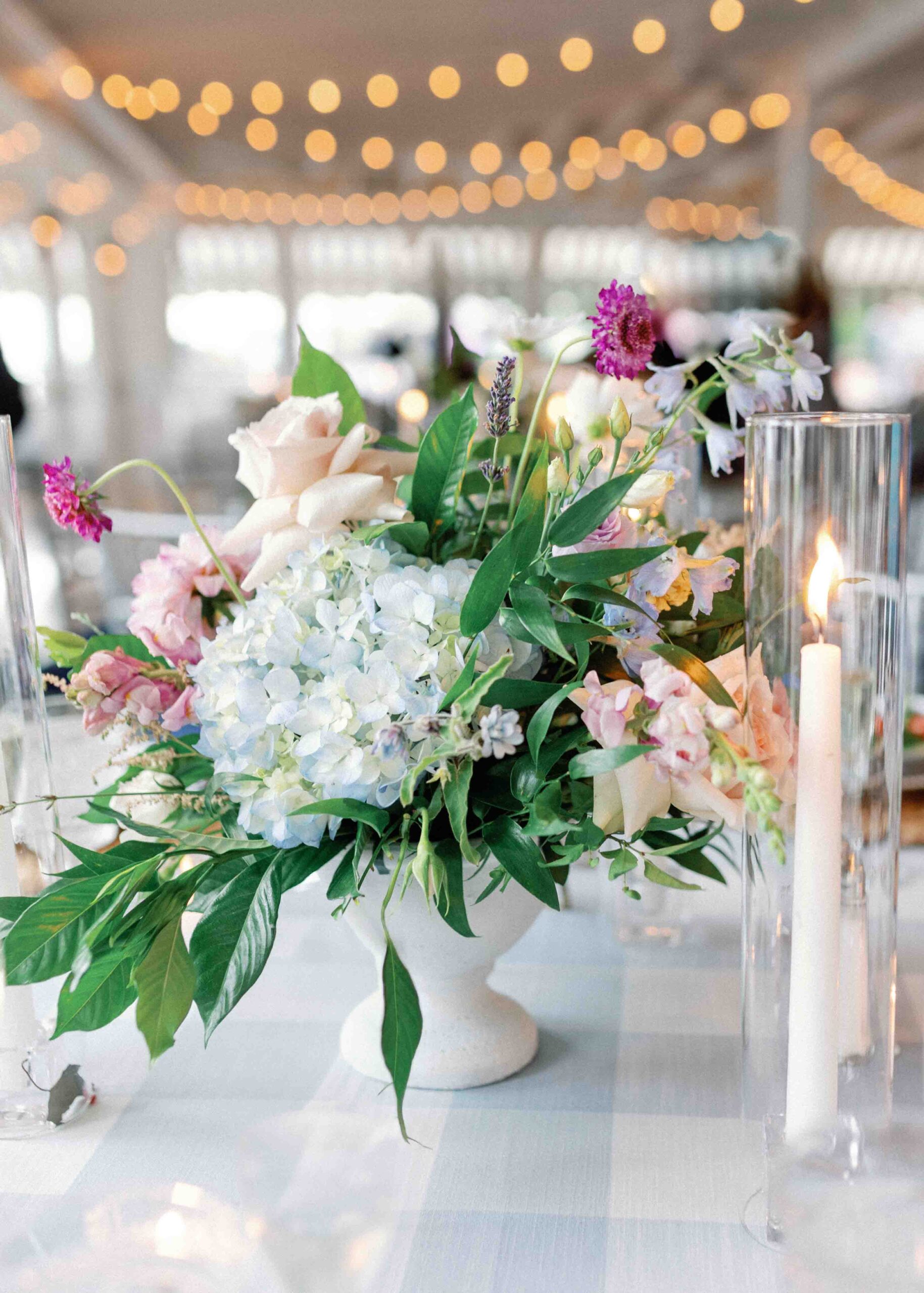 floral arrangement centerpiece with candles 