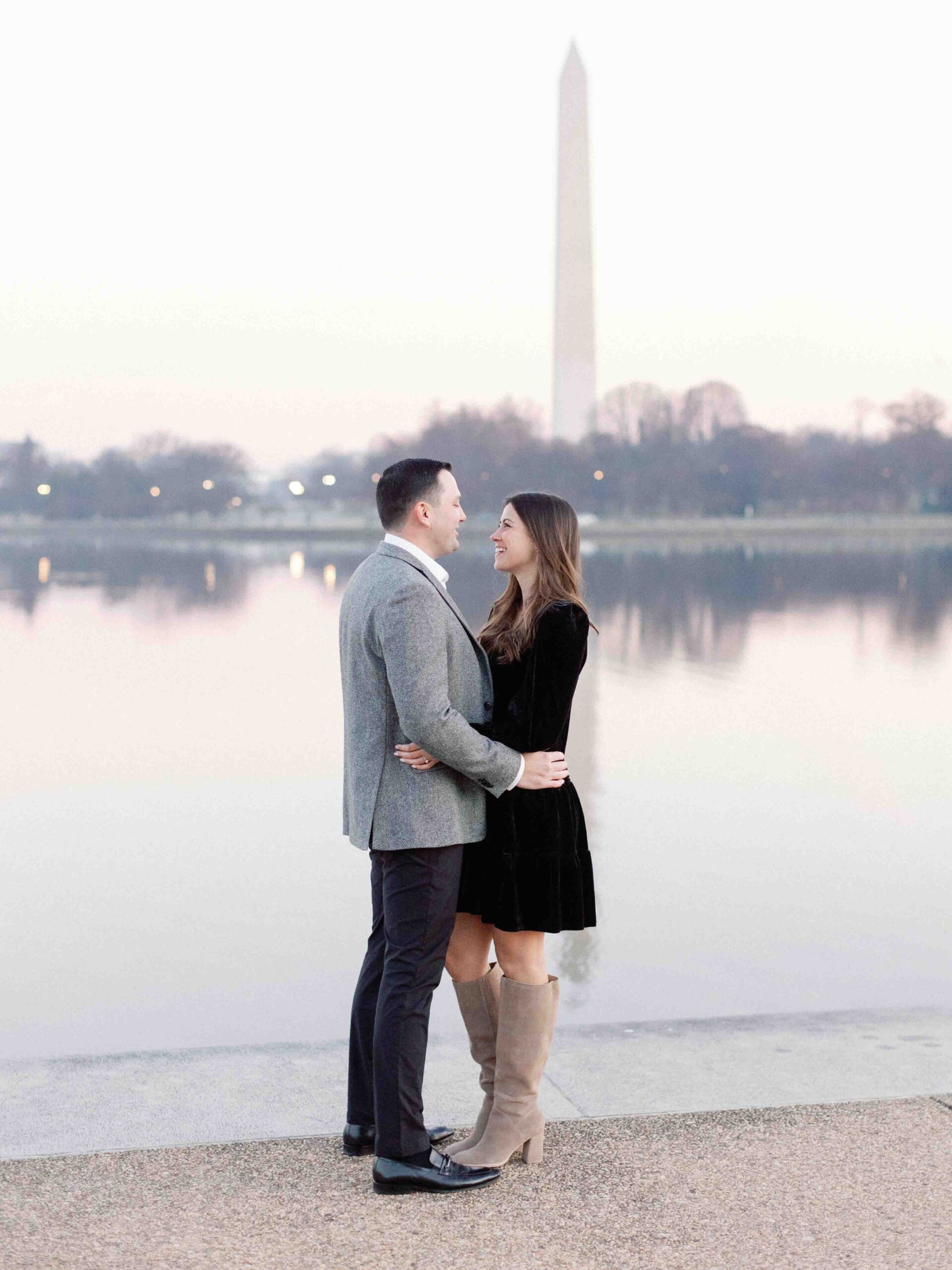 Couple standing in front of the tidal basin in DC